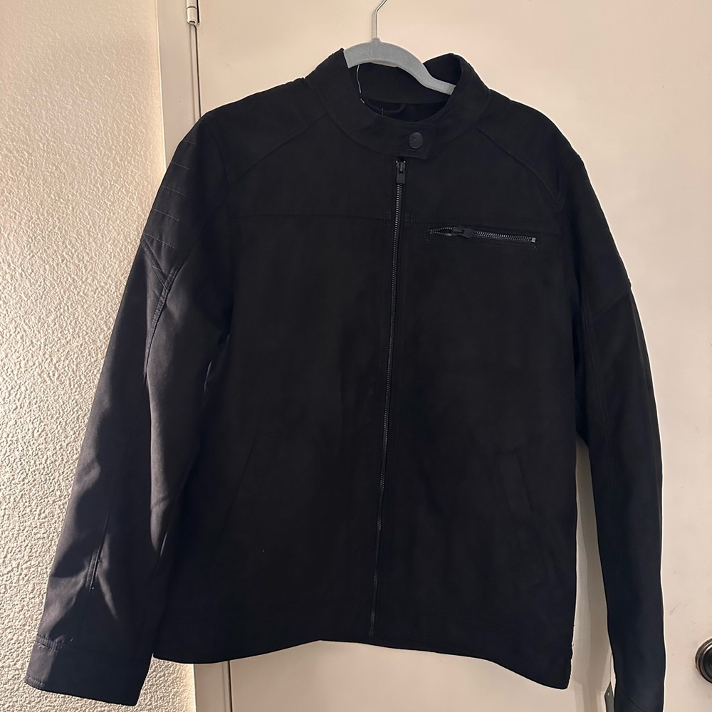 Brand Xray black swayed zip up jacket.